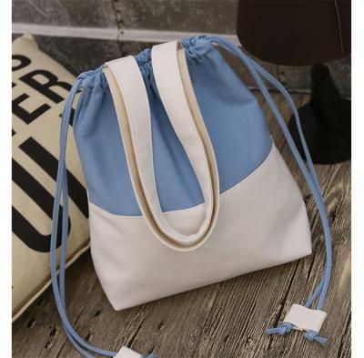 China Custom Personalized Small Recyclable White Designer Soft Fabric Canvas Drawstring Blank Non Woven Shopping Tote Bag With Logo for sale