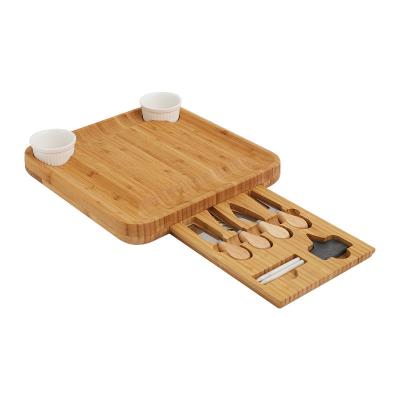 China Stocked Premium Bamboo Cheese Board Charcuterie Serving Board Tray and Knife Set with Hidden Slide-Out Drawer for sale