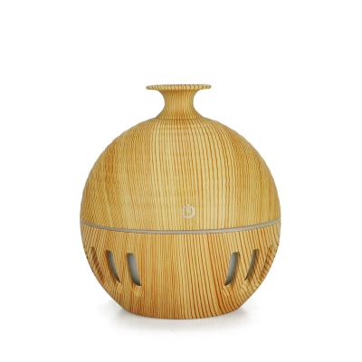 China Newest Modern Aromatherapy 150ml Purifier Wooden Aromatic Essential Oil 7 Led Color Air Humidifier Aroma Diffuser for sale