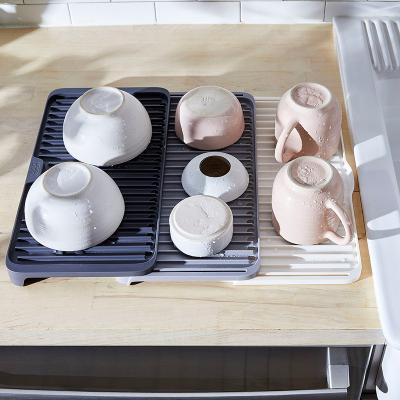 China New Multifunctional Minimalist Kitchen Creative Three Layers And Dish Storage Tray Adjustable Drain for sale