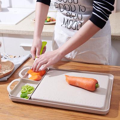 China High Quality Viable Wheat Straw Multifunctional Chopping Board Cutting Board For Kitchen With Two Storage Drawers for sale