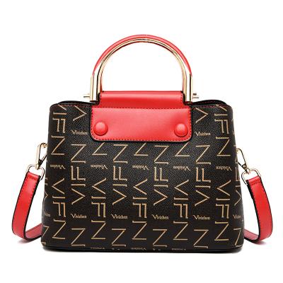 China Wholesale Hot Selling Large Capacity Fashion Women Handbag With Metal Handle And Cross - Body Belt for sale