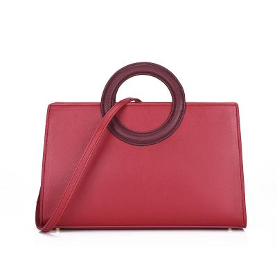 China Other Design Wedding Clutch Handbag With Strap Two Circle Shaped Shoulder Bag With Long Strap for sale