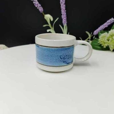 China Tazas de café de consumición de cerámica de la nueva porcelana de hueso con la cabeza de los gatos lindos de la goma en venta