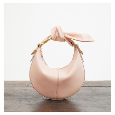 China Fashion personality European popular knot single arm lady bag femal clutch bag women handbags for sale