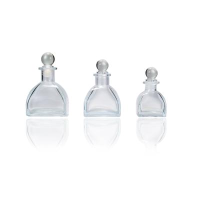 China Decorative Home Aromatherapy Glass Bottles Eco-friendly Recyclable 50ml 100ml 150ml Yurt Ger Tent Reed Diffuser Oil With Cork for sale