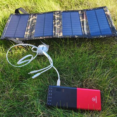 China Home Outdoor Application 12000mAh 4 Panels Solar Foldable Power Bank, Mobile Phone Portable Charger with Camping Light for sale