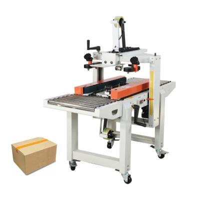 China Motor Carton Strapping Machine Model Milozenge 4030 High-speed Carton Double Box Automatic Food Box Sealing Machine for sale