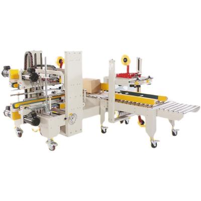 China Beverage Full Automatic Four-Corner Worker Full Automatic Fruit Seafood Foam Carton Folding Cover Case Sealer Machine Packing Tool for sale