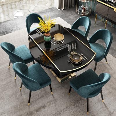 China Extendable Round Dining Table Set 6 Chairs Metal Stainless Steel Cover Black Scandinavian Ring Back Dining Chairs for sale