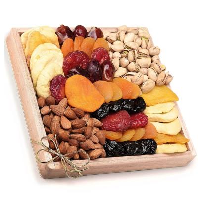 China Disposable Luxury Dried Fruit And Nut Gift Tray Layout On Wooden Tray for sale