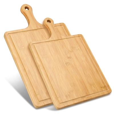 China Sustainable Kitchen Bamboo Wooden Cutting Board With Handle For Meat Vegetable Or Fruit for sale