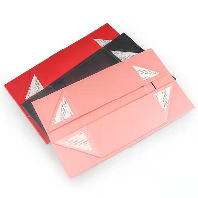 China Recyclable Exquisite Special Paper Packaging Bonded With Half Tape Cover Folding Gift Box Bow Double Sided Cardboard for sale