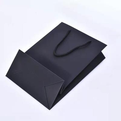 China Recyclable Paper Rope Gift Bags Manufacturer Black Paper Bag Direct Supply for sale