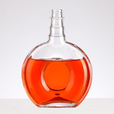 China Glass Round Shape 700ml 750ml Clear Empty Flint Liquor Wine Vodka Tequila Bottle for sale