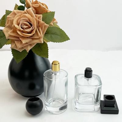 China Kleefband Materiaal Glasproducten Leeg Parfum Cylinder Glasflessen 30ml 50ml 100ml Te koop