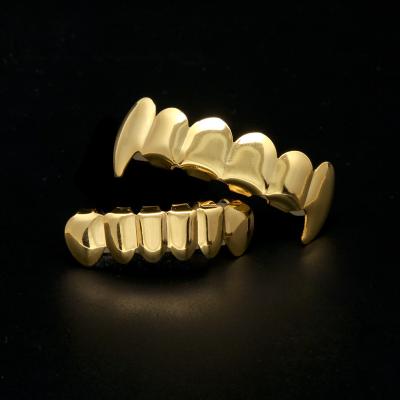 China Fashion FASHION wholesale high quality grills teethers custom made smooth and bright gold grillz charm jewelry hiphop teeth grillz teeth for sale