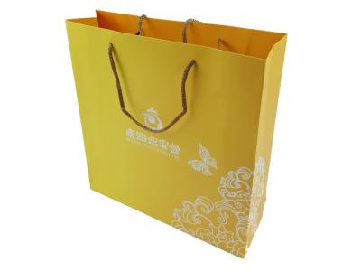 China Gold Color Paper Printing Customized Logo Embossing Rigid Cardboard Material Big Size Custom Design Paper Bags for sale