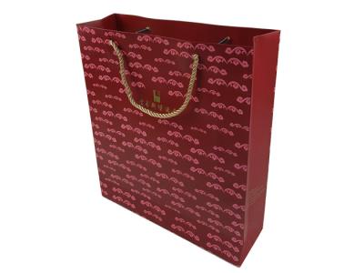 China Paper Material Background Full Brown Color Printing Customized Design Paper Bags OEM Printing Factory with Rigid Handle for sale