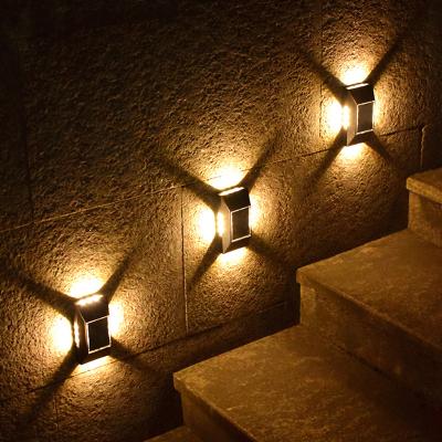 China LANDSCAPE Newest 12 Led Solar Wall Light Outdoor Porch Garden 4 Sides Outdoor Solar Garden Wall Lamp Light Up And Down For Staircase for sale