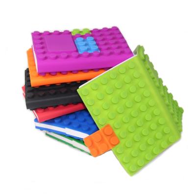 China Eco-friendly Kids Stationery School Novelty Notebook Funny Silicone Cover Kids Color Dot Patch Puzzle Toy Brick Notebook for sale