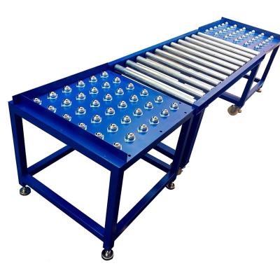 China Motorless Heat Resistant And Easy To Move Universal Ball Table Roller Conveyor for sale