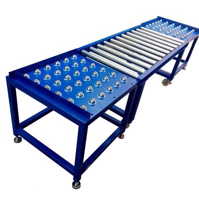 China Heat Resistant Universal Ball And Roller Conveyor Work Table, Easy Rotate Work Table for sale