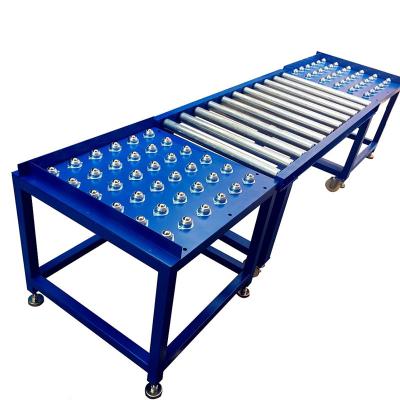 China Transfer Ball Conveyor Heat Resistant Roller Table for sale