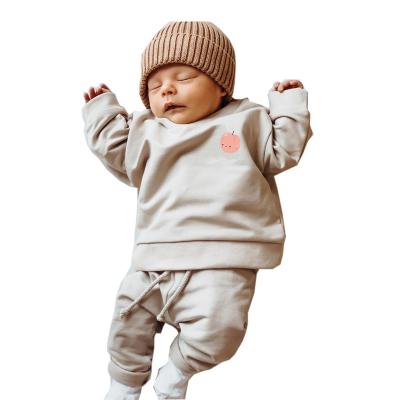 China custom Anti-wrinkle print babies clothes high quality unisex sports suit solid color fleece kids winter tracksuit two-piece baby clothing set for sale