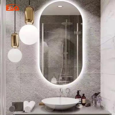 China Modern Style Illuminated Wall Mounted Led Mirror Bathroom Smart Oval Mirror for sale