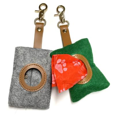 China Viable Felt Dog Poop Bag Outdoor Pet Supplies Portable Dispenser With Metal Button for sale