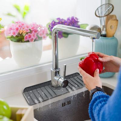 China Amazon Viable Hot Selling 2022 Translucent Water Catcher Drying Pads Ferns Splash Silicone Free Faucet Guard M5 BPA Absorbent Sink Mat for sale