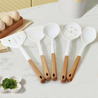 China Viable Non-Stick Silicone Kitchen Home Accessories Sets Wooden Handle Cooking Kitchen Tools With Spatula Silicone Cooking Utensils for sale