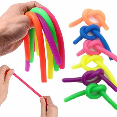 China Relieve Stress Hot Selling Stirring Toy Decompression Soft Rubber Tpr Noodle Duct Suction Rope Baby Monkey Noodle Stirring Person For Sensory Toys for sale