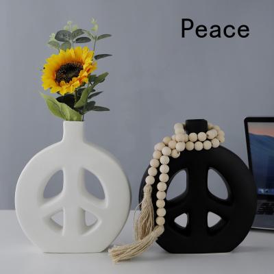 China New Modern Creative Gift Vase Peace Donut Ceramic Flower Vase Home Decoration For Office Living Room Decoration for sale