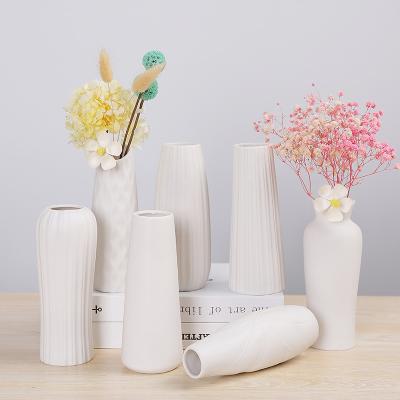 China Nordic popular modern geometry mini tabletop living room ceramic flower vase for home decoration for sale