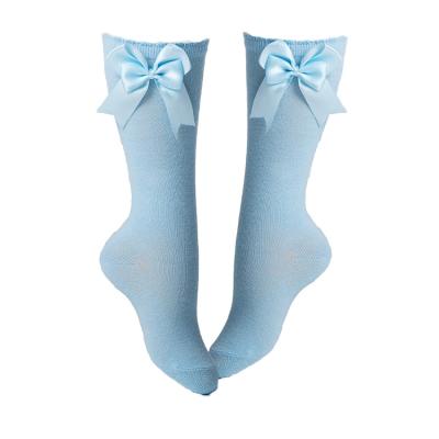 China Baby Kids Solid Color Bow Antibacterial Soft Cotton Long Knee High Stocking Socks for sale