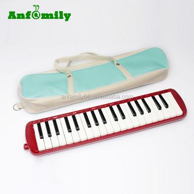 China 37Key Melodica Musical Instrument OEM Brass Service In Premium Leather Bag for sale