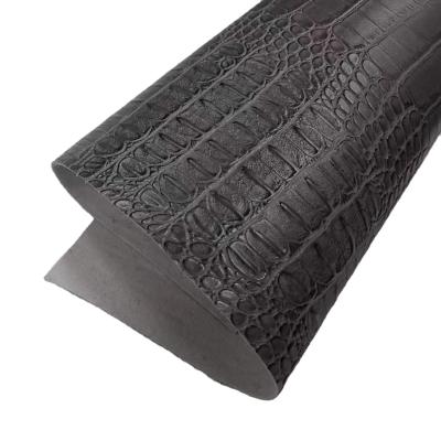 China Backing Imitation Faux Faux Leather Hotsale Embossed Croc PU Cotton Abrasion-Resistant Leather Fabric For Making Bags Pinch Synthetic Leather Roll for sale