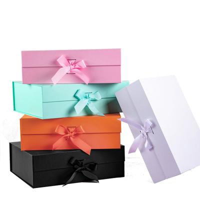 China High Quality Recycled Materials Packaging Folding Magnet Paper Gift Box With Ribbon Closure for sale