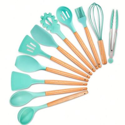 China Amazon Best Sustainable Selling Food Gragde Wood Handle Silicone Kitchen Utensils Set 11 Pcs Baking Utensils Set Nonstick Cooking Spoon for sale