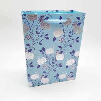 China M Wholesale Luxury Recyclable Purse Shopping Gift Packing Stamping Printed Paper Bag With Ribbon Handle Flower for sale