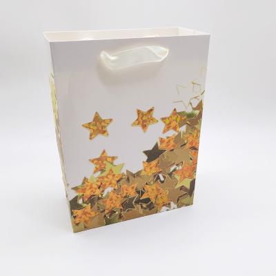 China M Wholesale Luxury Recyclable Purse Shopping Gift Packing Stamping Printed Paper Bag With Ribbon Handle for sale