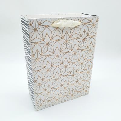 China M Wholesale Luxury Recyclable Shopping Bag Gift Glitter Printed Paper Bag With Ribbon Handle for sale