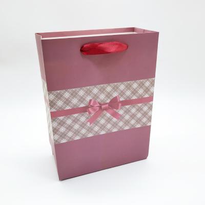 China M Wholesale Luxury Recyclable Purse Shopping Gift Packing Printed Paper Bag With Ribbon Handle for sale