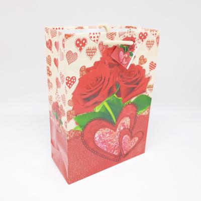 China Wholesale Recyclable Cheap Small Paper Bag Heart Design Printing Gift Packaging Bag Jewelry Bag for sale