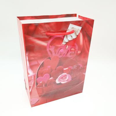 China Wholesale Recyclable Cheap Small Paper Bag Heart Design Printing Gift Packaging Bag Jewelry Bag for sale