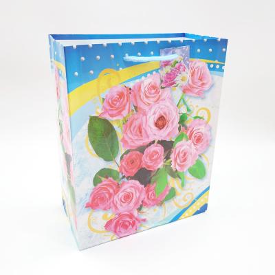 China Disposable Wholesale Cheap Small Paper Bag Flower Printing Gift Packaging Bag Jewelry Bag for sale