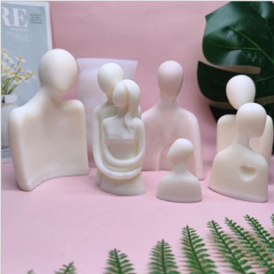 China New Design Disposable Single Embrace Candle Making Mold Family Members Silicon Candle Mold for sale