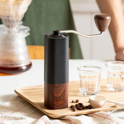 China Modern Portable Coffee Grinder Hot Sale Customized Logo Color Manual Metal Hand Grinder Kopi Coffee Grinder With Stainless Steel Core for sale